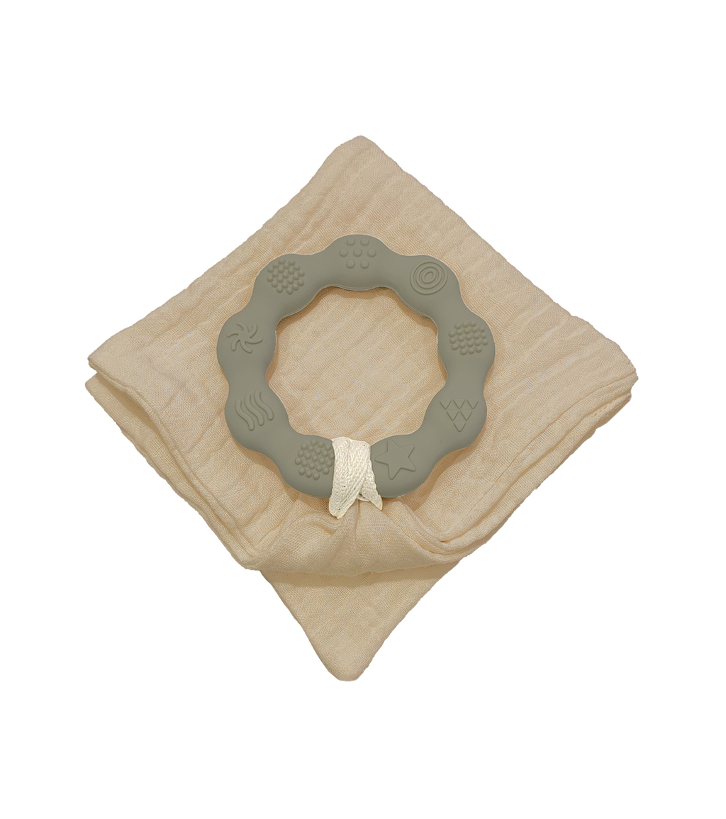 Anneau de dentition vert et lange sable