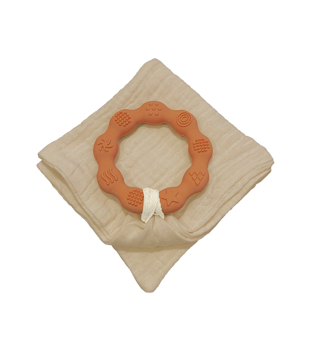 Anneau de dentition terracotta et lange sable